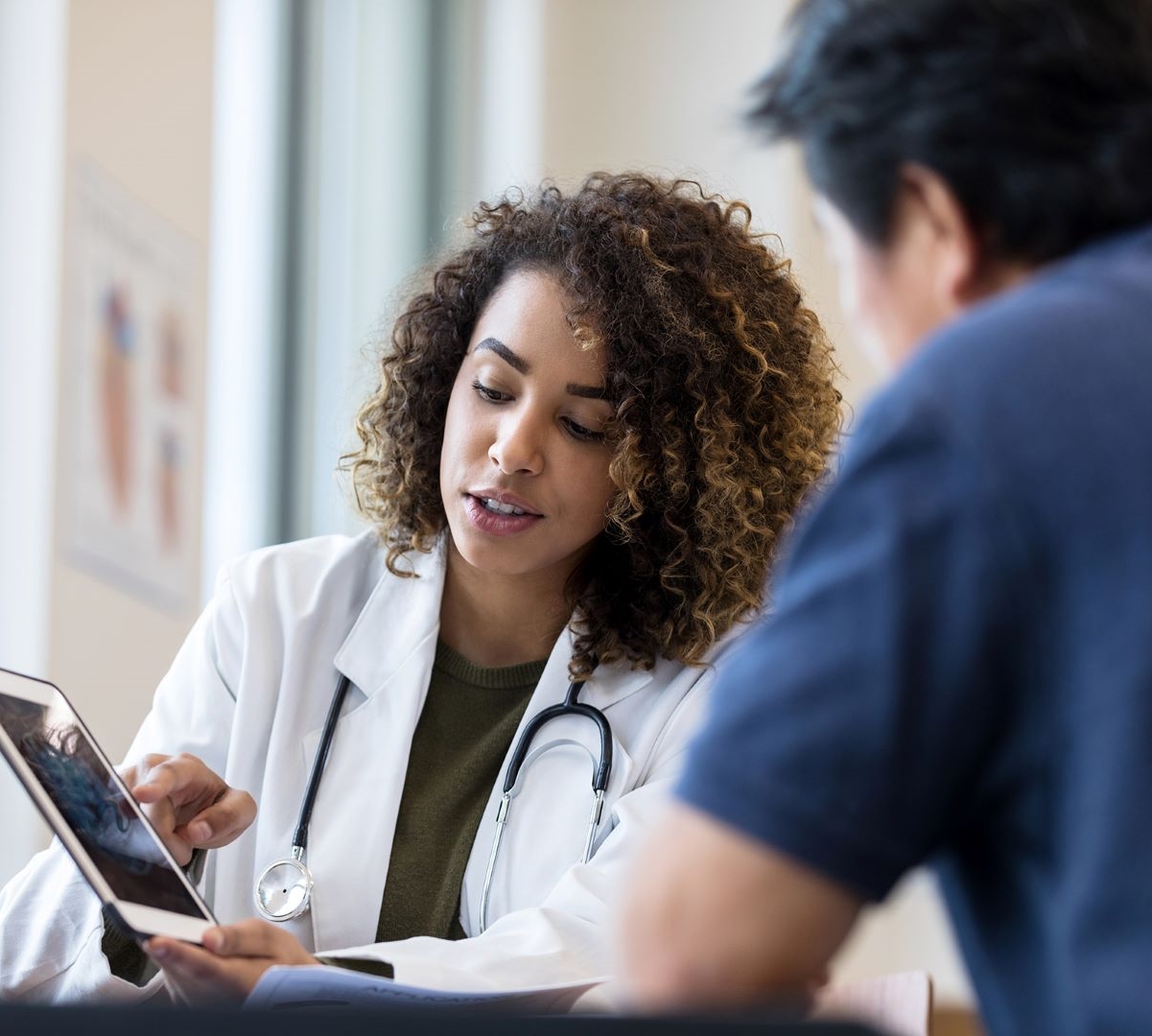 Doctor speaking to patient