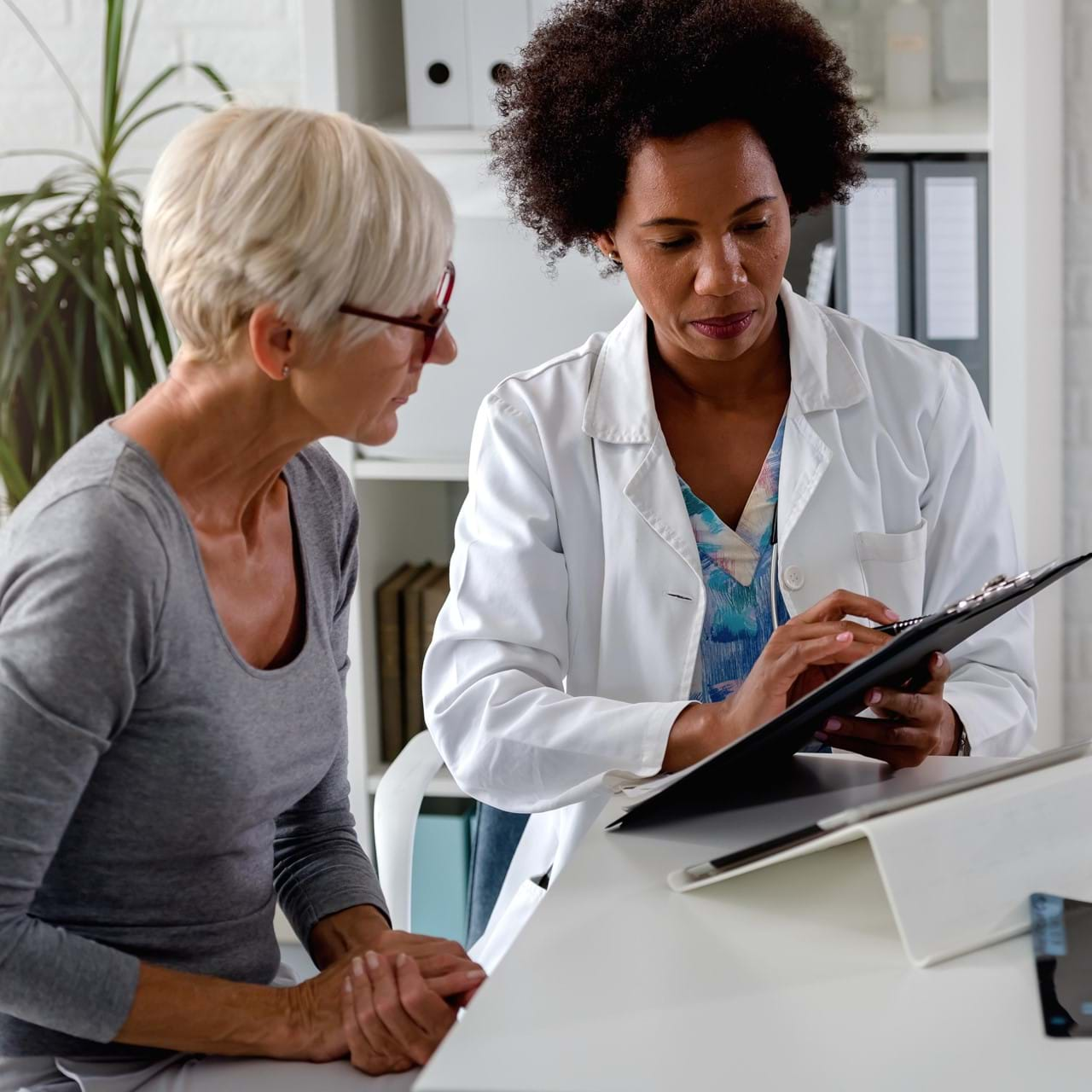 Doctor speaking to patient